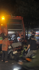 Garbage truck-motorcycle accident aftermath documented in North Jakarta