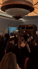 Late-night social gathering documented at London bar venue