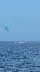 Morning kitesurfing session draws activity to Denpasar beach waters