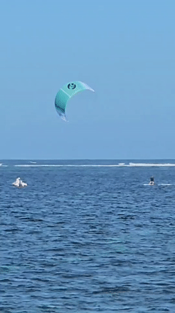 Morning kitesurfing session draws activity to Denpasar beach waters