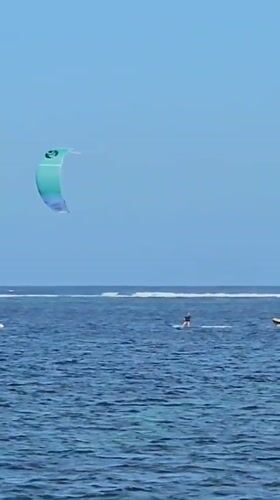Morning kitesurfing session draws activity to Denpasar beach waters