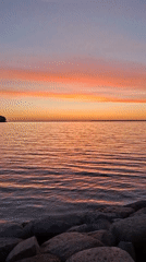 Marina sunset draws photographers, walkers, cyclists during golden hour