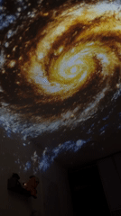 Art installation with galaxy projections documented in Kiryat Bialik