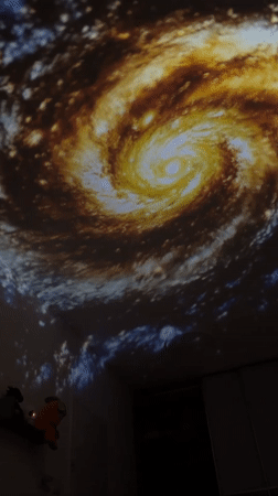 Art installation with galaxy projections documented in Kiryat Bialik