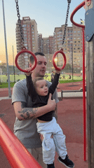 Family playground visit captured in Russian suburb during evening