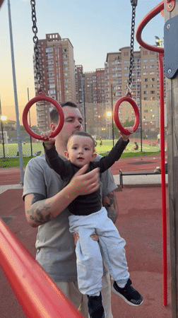 Family playground visit captured in Russian suburb during evening