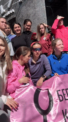 Women gather outdoors in Moscow park on sunny morning