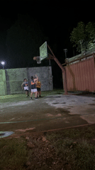 Nighttime basketball game and gathering in Tagum City
