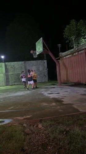 Nighttime basketball game and gathering in Tagum City