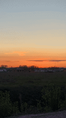 Mother and child enjoy sunset evening in Горный, Russia