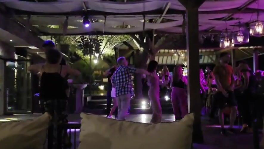 Outdoor night venue in Varna — dancing under string lights