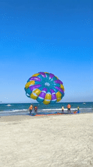 Parasailing in action on a Da Nang beach morning