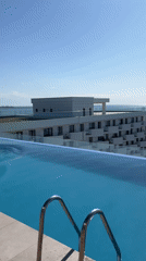 Rooftop infinity pool overlooking the Black Sea in Năvodari