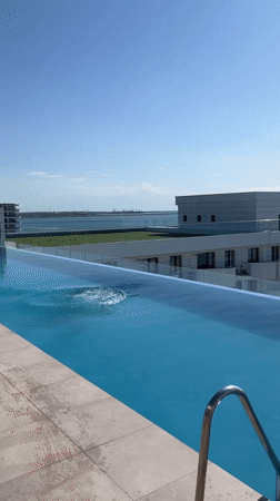 Rooftop infinity pool overlooking the Black Sea in Năvodari