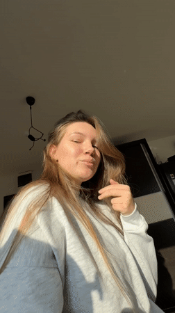 Woman takes selfie with laptop in Belgrade suburb