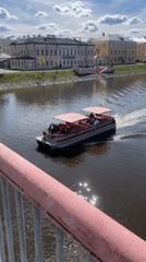 Spring day brings crowds to Vologda River waterfront