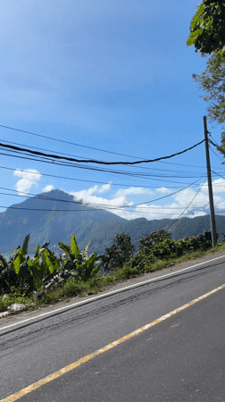 Tourist captures Mount Batur lakeside views in Kintamani, Indonesia