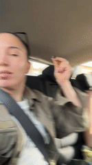 Women film selfie video during car ride in Giza