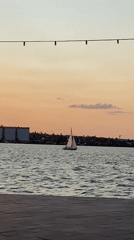Big band plays waterfront outdoor set at sunset
