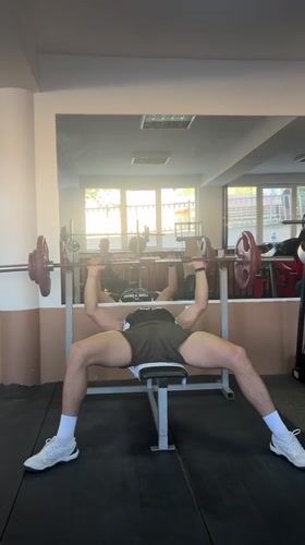 Man conducts bench press workout at Zlatograd gym