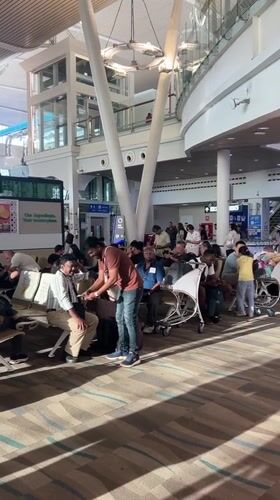 Morning transit through Phuket Airport's terminal and duty-free shops