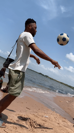 Man practices soccer tricks on Ikorodu beach