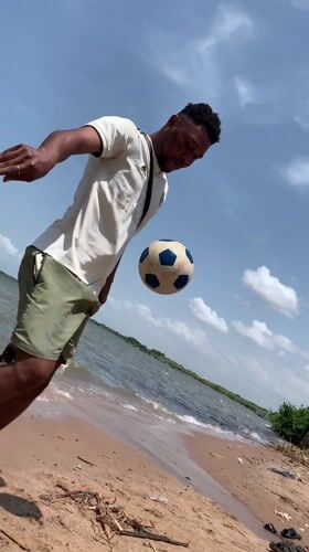 Man practices soccer tricks on Ikorodu beach