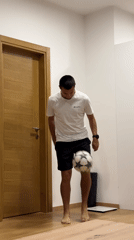 Man practices soccer juggling indoors in Montenegro apartment