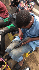 Roadside cobbler work in progress, Ikeja market area