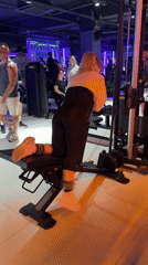 Woman takes gym selfies during workout session in Perm