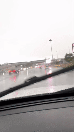 Driver caught in Moscow traffic jam during rainy afternoon
