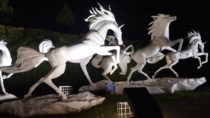 Semarang's illuminated street sculptures at night