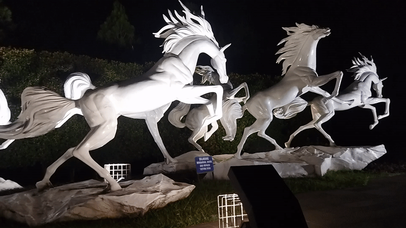 Semarang's illuminated street sculptures at night