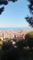 Aerial views capture Barcelona's skyline featuring Sagrada Familia construction