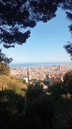 Aerial views capture Barcelona's skyline featuring Sagrada Familia construction