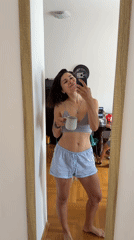 Woman's Morning Routine Documented in Budva Bathroom Selfies