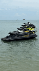 Jet skis moored in calm waters off Choeng Mon