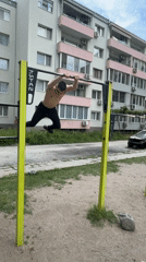 Man performs gymnastics on park equipment in Plovdiv