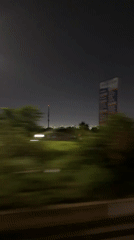 Nighttime vehicle journey recorded through Accra streets