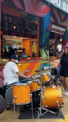 Live band performs outside colorful São Paulo restaurant