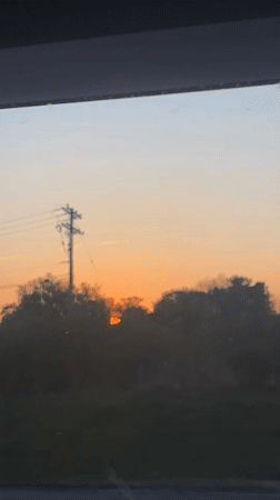 Sunrise filmed through car window in Rotterdam, New York