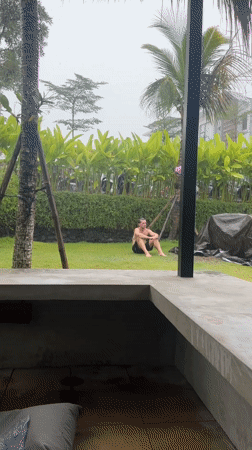 Rain and selfies captured in Mengwi tropical setting