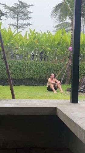 Rain and selfies captured in Mengwi tropical setting