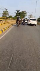 Moving through Banjarmasin streets, two road-level views