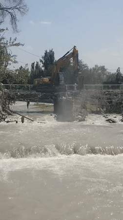 Bridge repair underway as murky river runs high in Bishkek