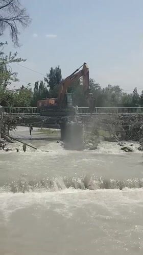 Bridge repair underway as murky river runs high in Bishkek