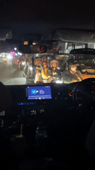 Night traffic jam with motorcycles observed in Denpasar