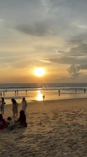 Sunset beach volleyball and golden hour scenes at Karon Beach