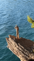 Tourists enjoy sunny afternoon at Montenegro's Sveti Stefan resort