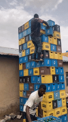 Beer delivery truck unloaded in Bukuru, Nigeria